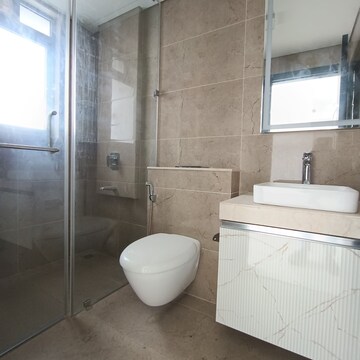 Bathroom in 3 BHK Apartment at Oberoi Sky City, Khande Rao Dongari – for Rent