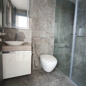 Bathroom in 3 BHK Apartment at Oberoi Sky City, Khande Rao Dongari – for Rent