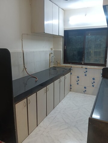 Kitchen in 2 BHK Apartment at Sai Deep CHS Goregaon West, Goregaon West – for Rent