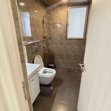 Bathroom in 3 BHK Apartment at Shapoorji Pallonji Alpine, Singh Agri Estate – for Rent