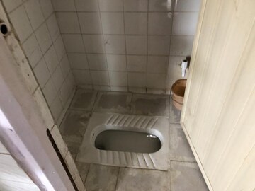 Bathroom in 1 BHK Apartment at Kapare Heights, Anand Nagar – for Rent