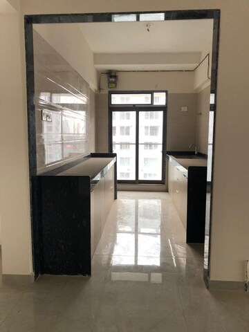 Kitchen in 3 BHK Apartment at Je And Vee Om Trimurti, Malad East – for Rent
