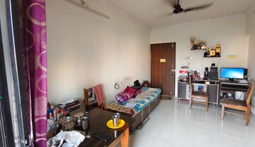 Living Room in 1 BHK Apartment at Raunak Delight, Owale – for Sale