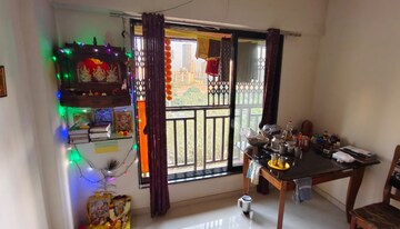 Living Room in 1 BHK Apartment at Raunak Delight, Owale – for Sale