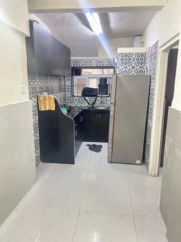 Kitchen in 1 BHK Apartment at Montana CHS, Andheri West – for Sale