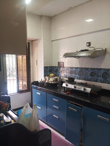 Kitchen in 2 BHK Apartment at Shree Laxmi Basera Apartments, Mazgaon – for Sale
