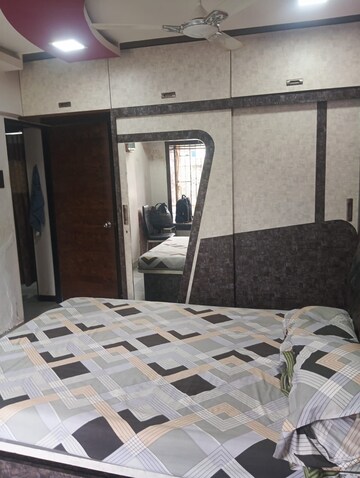 Bedroom in 2 BHK Apartment at Shree Laxmi Basera Apartments, Mazgaon – for Sale