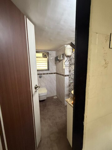 Attached Bathroom in 1 BHK Apartment at Golden Chariot CHS, Lokhandwala Complex – for Sale