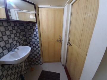 Bathroom in 2 BHK Apartment at Sai Ganesh Vihar, Vadgaon Budruk – for Rent