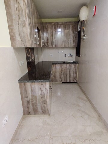 Kitchen in 2 BHK Builder Floor at Freedom Fighters Enclave – for Rent