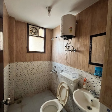 Bathroom in 2 BHK Apartment at Apex Our Residency, Garoli Kalan – for Rent