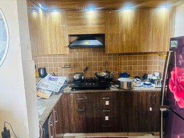 Kitchen in 2 BHK Apartment at Mahagun Mywoods, Sector 16c Greater Noida – for Rent