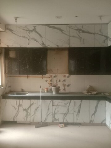 Kitchen in 2 BHK Apartment at Mahagun Mywoods, Sector 16c Greater Noida – for Rent