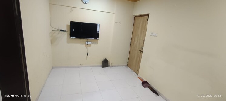 Living Room, rna-ng-regency-phase-i 2 Bedroom 550 Sq.Ft. Apartment In Balkum Pada Thane 9109232