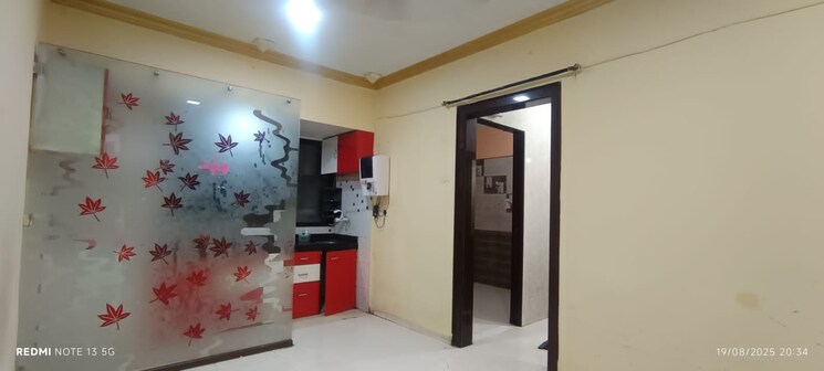 Living Room, rna-ng-regency-phase-i 2 Bedroom 550 Sq.Ft. Apartment In Balkum Pada Thane 9109232