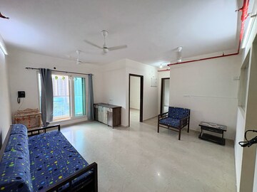 Living Room in 2 BHK Apartment at Dosti West County, Kolshet Industrial Area – for Rent