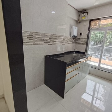 Kitchen in 2 BHK Apartment at Jiten Apartment, Andheri West – for Rent