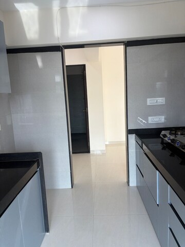 Kitchen in 2 BHK Apartment at Bini Winspace Amelio, Andheri West – for Rent