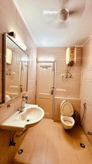 Bathroom in 2 BHK Builder Floor at Freedom Fighters Enclave – for Rent