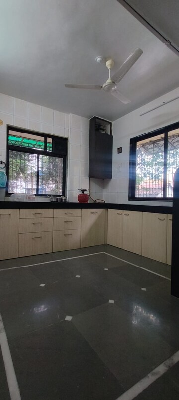 Kitchen in 3 BHK Apartment at Harikunj Enclave, Naupada – for Sale