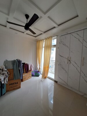 Living Room in 4 BHK Apartment at Sushant Golf City – for Sale