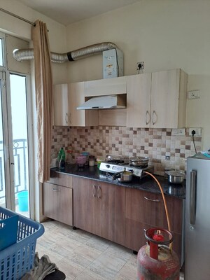 Kitchen in 4 BHK Apartment at Sushant Golf City – for Sale