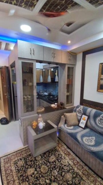 Living Room in 1 BHK Apartment at Lodha Crown Quality Homes, Majiwada – for Rent