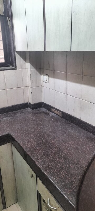 Kitchen in 1 BHK Apartment at Udayraj Yashodhan CHS, Vile Parle East – for Rent