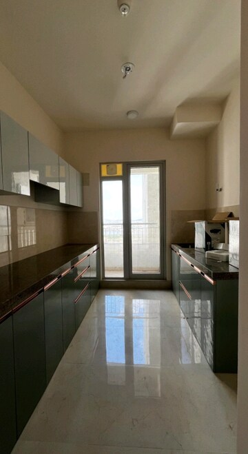 Kitchen in 2 BHK Apartment at Piramal Vaikunth, Balkum Pada – for Rent