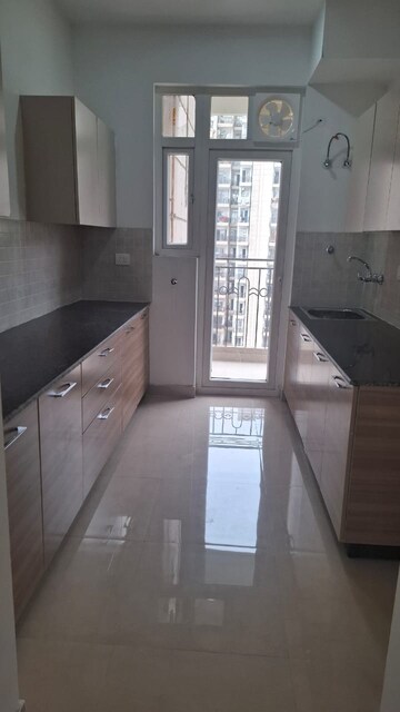 Kitchen in 3 BHK Apartment at ATS Nobility, Sector 4 Greater Noida – for Rent