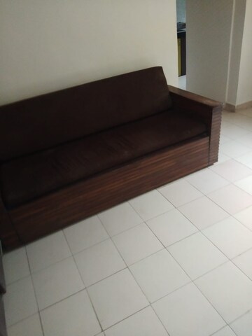 Living Room in 1 BHK Apartment at Swastik Park CHS, Ghodbunder Road – for Sale