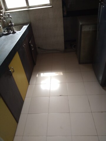 Kitchen in 1 BHK Apartment at Swastik Park CHS, Ghodbunder Road – for Sale