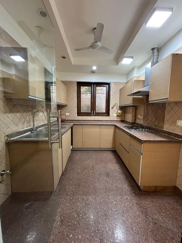 Kitchen, uday park 3 Bedroom 1500 Sq.Ft. Builder Floor In Uday Park Delhi 9109999