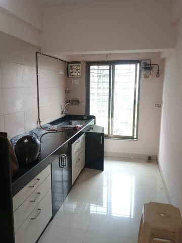 Kitchen in 2 BHK Apartment at Khandelwal Basera, Andheri West – for Rent