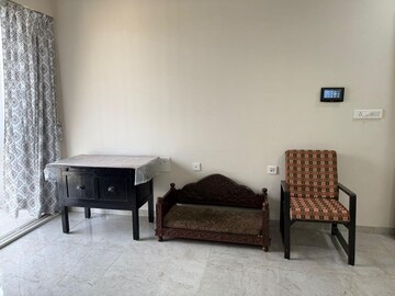 Living Room in 1 BHK Apartment at Tata Serein, Pokhran Road No Two – for Rent