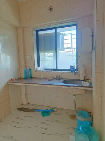 Kitchen in 1 BHK Apartment at Royal Palms Garden View, Goregaon East – for Rent