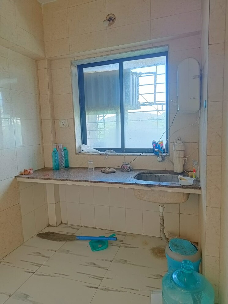 Kitchen, royal-palms-garden-view 1 Bedroom 540 Sq.Ft. Apartment In Goregaon East Mumbai 9110253