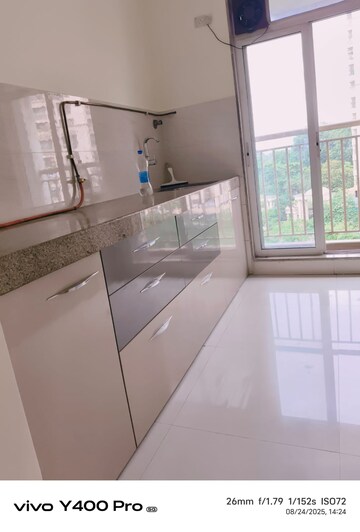 Kitchen in 1 BHK Apartment at Metropolis Aquaris Phase 1, Kasarvadavali – for Sale