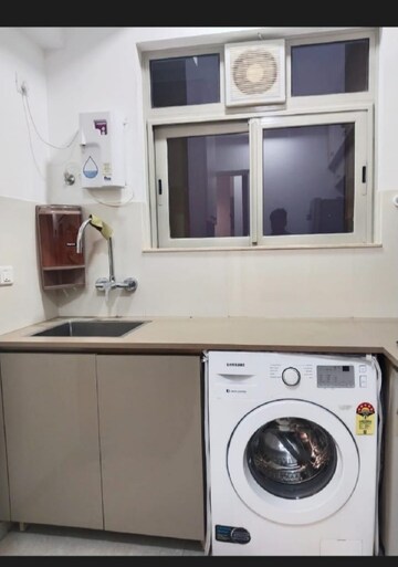 Kitchen in 1 BHK Apartment at Hiranandani Estate Solitaire C, Ghodbunder Road – for Rent