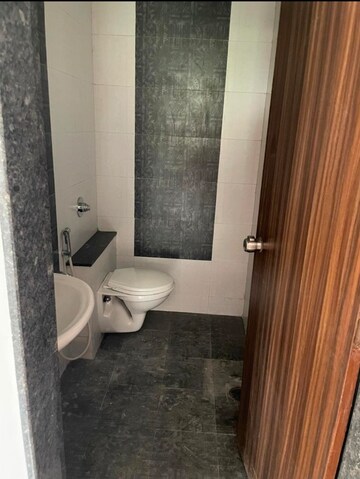Bathroom in 2 BHK Apartment at Geeta Gold Floristaa, Kharadi – for Rent