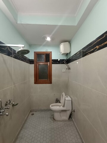 Bathroom in 3 BHK Builder Floor at Kanha Apartments Indirapuram, Shakti Khand 2 – for Rent