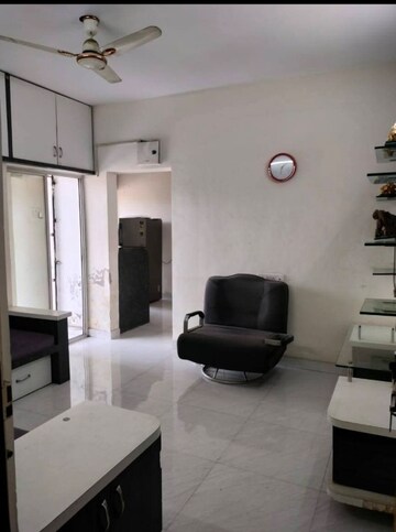 Living Room in 2 BHK Apartment at Karan Athena, Wadgaon Sheri – for Rent