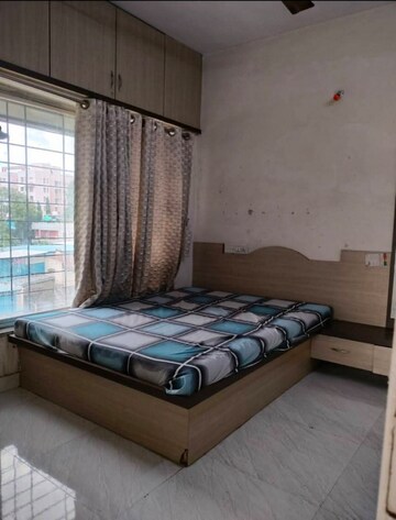 Bedroom in 2 BHK Apartment at Karan Athena, Wadgaon Sheri – for Rent