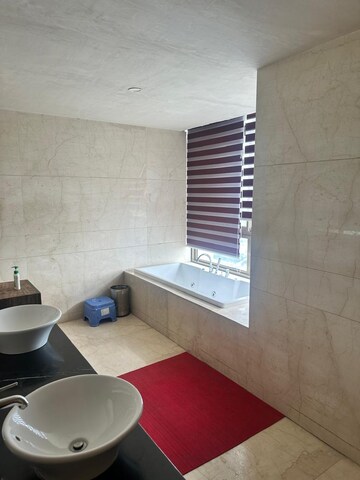 Bathroom in 4 BHK Apartment at Parsvnath Exotica, Sector 53 – for Rent