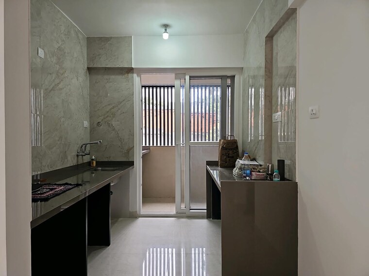 Kitchen, nirman-adi 3 Bedroom 1000 Sq.Ft. Apartment In Kalyani Nagar Pune 9110704