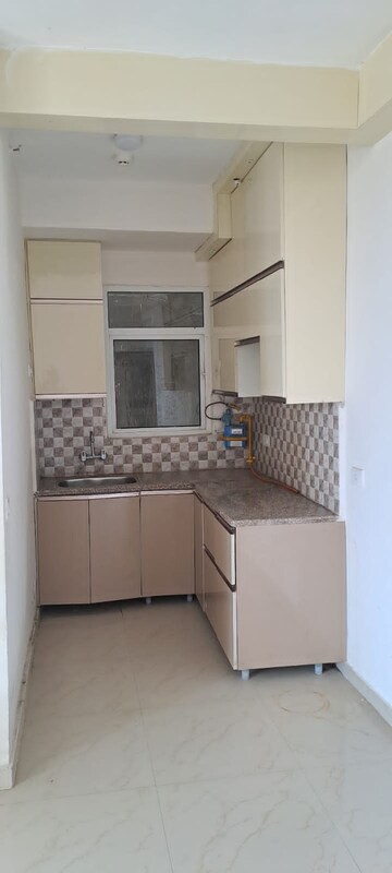 Kitchen in 2 BHK Apartment at Mahagun Mantra II, Sector 10 Greater Noida – for Rent