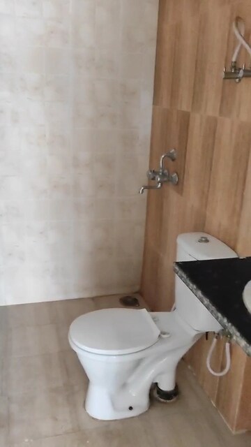 Bathroom in 3 BHK Apartment at Mahagun Mantra I, Sector 10 Greater Noida – for Rent