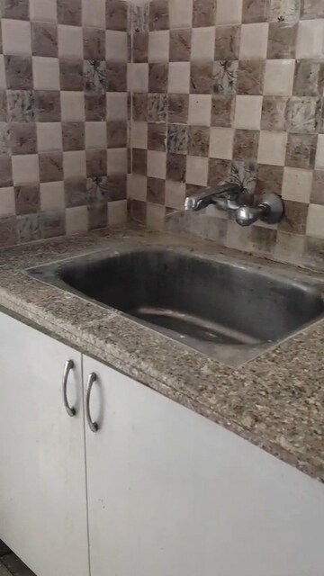 Kitchen in 3 BHK Apartment at Mahagun Mantra I, Sector 10 Greater Noida – for Rent