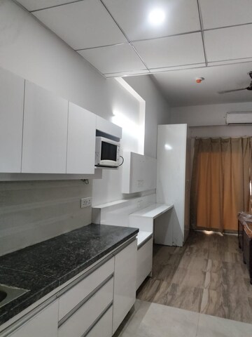 Kitchen in 1 BHK Apartment at Paramount Golfforeste, Zeta I Greater Noida – for Rent