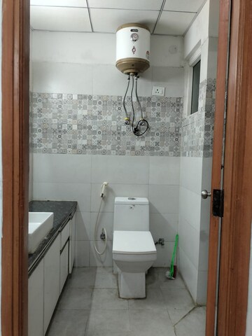 Bathroom in 1 BHK Apartment at Paramount Golfforeste, Zeta I Greater Noida – for Rent